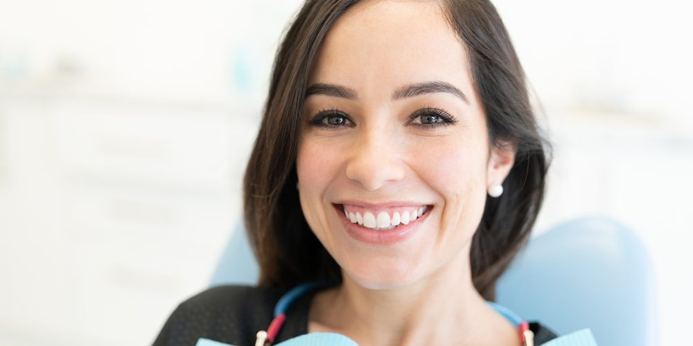 Closeup,Of,Happy,Caucasian,Mid,Adult,Woman,At,Dental,Clinic affordable dentist in Hamilton, OH Hamilton Riverside Dentistry