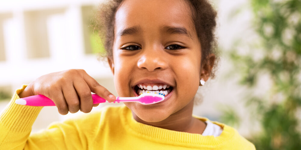 Little,Beautiful,African,Girl,Brushing,Teeth,,Healthy,Concept Dentist for Kids in Hamilton, OH Hamilton Riverside Dentistry