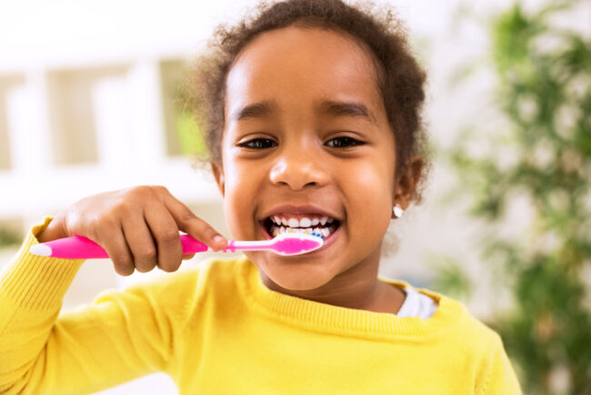 Little,Beautiful,African,Girl,Brushing,Teeth,,Healthy,Concept Dentist for Kids in Hamilton, OH Hamilton Riverside Dentistry